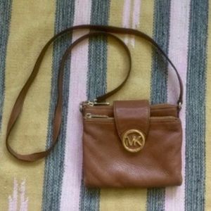 Michael Kors Crossbody Bag is Saddle Brown